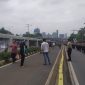 Polda Metro Jaya mengalihkan arus lalu lintas dilakukan di sekitar Gedung DPR/MPR, / Net