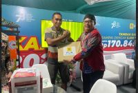 Ilustrasi pemberian hadiah kejutan kepada pelanggan setia PLN yang melakukan pembayaran tepat waktu selama periode Januari hingga Agustus.