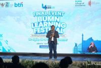 ILUSTRASI. Deputi Bidang Sumber Daya Manusia, Teknologi, dan Informasi Kementerian BUMN Tedi Bharata memberikan sambutan dalam acara puncak BUMN Learning Festival 2024. Telkom dinobatkan sebagai The Most Outstanding BUMN Learning.