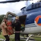 Proses distribusi bantuan logistik ke Desa Kuala II, Kecamatan Bintang, Kabupaten Aceh Tengah, Provinsi Aceh pada Selasa (2/12). Kondisi cuaca cukup menjadi tantangan dalam disribusi logistik ini. Namun, tim gabungan tetap berupaya semaksimal mungkin untuk menjangkau lokasi yang menjadi titik pendaratan. / foto ist