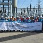 Para personel PLN Group bersama Tim Tenaga Switchgear (TSG) dan Tenaga Nasional Berhad (TNB) ketika menandai penyelesaian pekerjaan Substation 132 kV Tunjung, Kelantan yang menjadi bagian dari The East Coast Rail Link (ECRL)