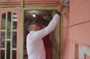 Seremoni penyalaan listrik di salah satu rumah warga penerima manfaat program listrik Desa Patialo, Kabupaten Mandailing Natal, Sumatera Utara oleh Bupati Mandailing Natal, Saipullah Nasution.